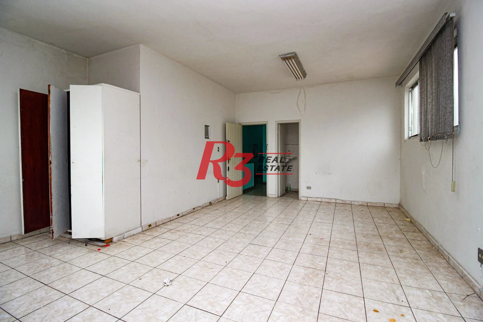 Loja, 570 m² - venda por R$ 3.000.000,00 ou aluguel por R$ 26.060,00/mês - Encruzilhada - Santos/SP