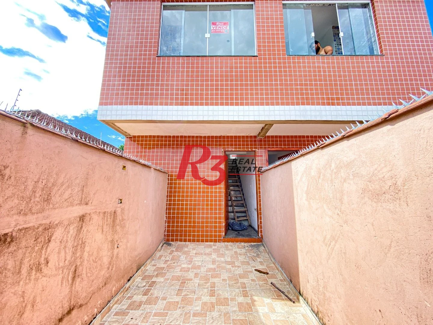 Casa sobreposta alta com 2 dormitórios à venda, 60 m² - Chico de Paula - Santos/SP