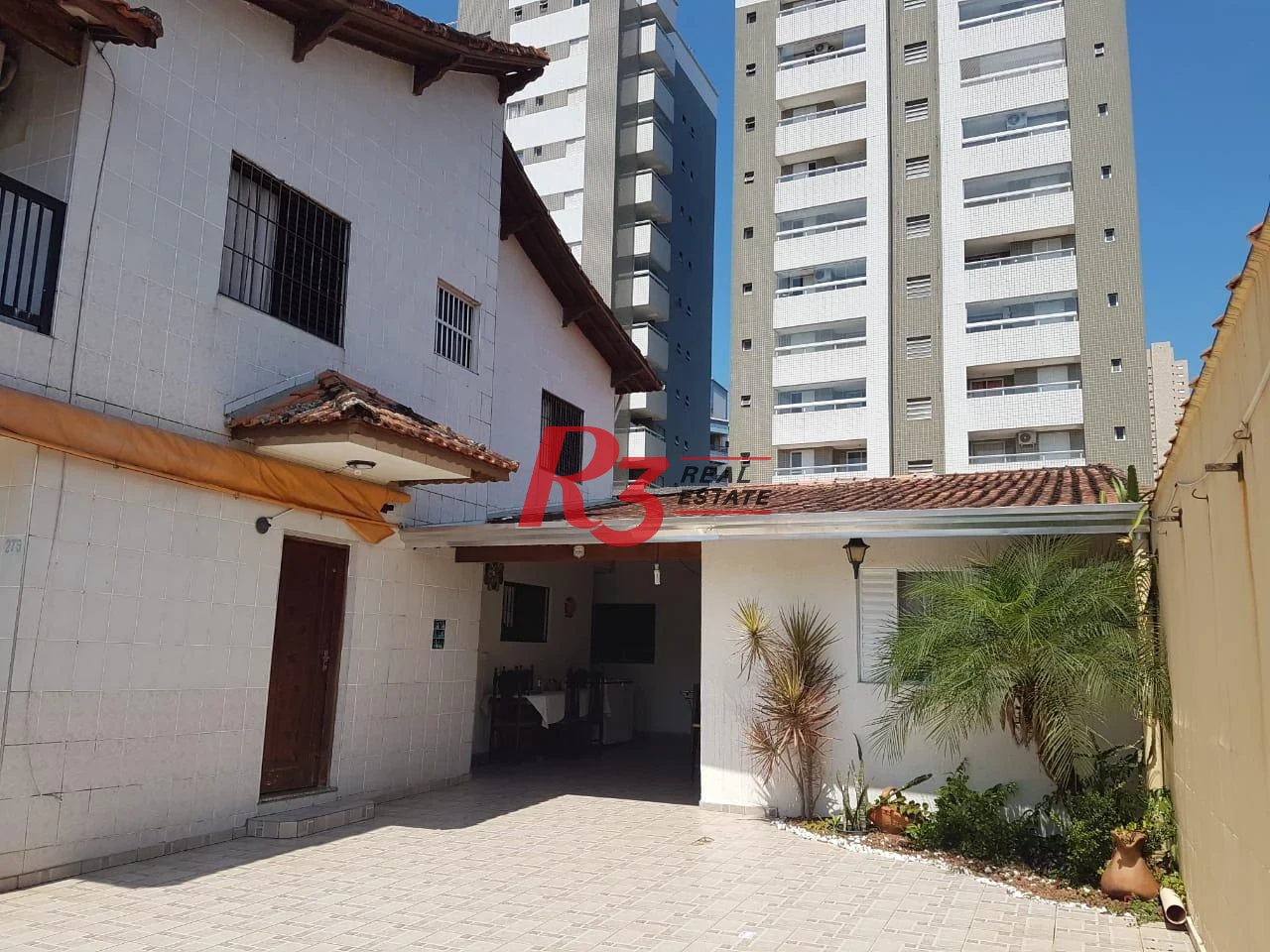 Sobrado com 3 dormitórios à venda, 124 m² por R$ 930.000,00 - Mirim - Praia Grande/SP