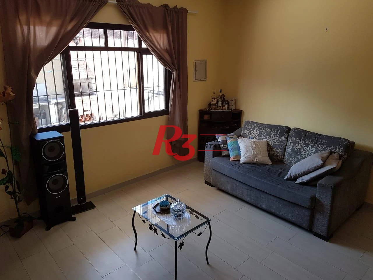 Sobrado com 3 dormitórios à venda, 124 m² por R$ 930.000,00 - Mirim - Praia Grande/SP