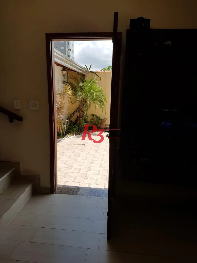 Sobrado com 3 dormitórios à venda, 124 m² por R$ 930.000,00 - Mirim - Praia Grande/SP