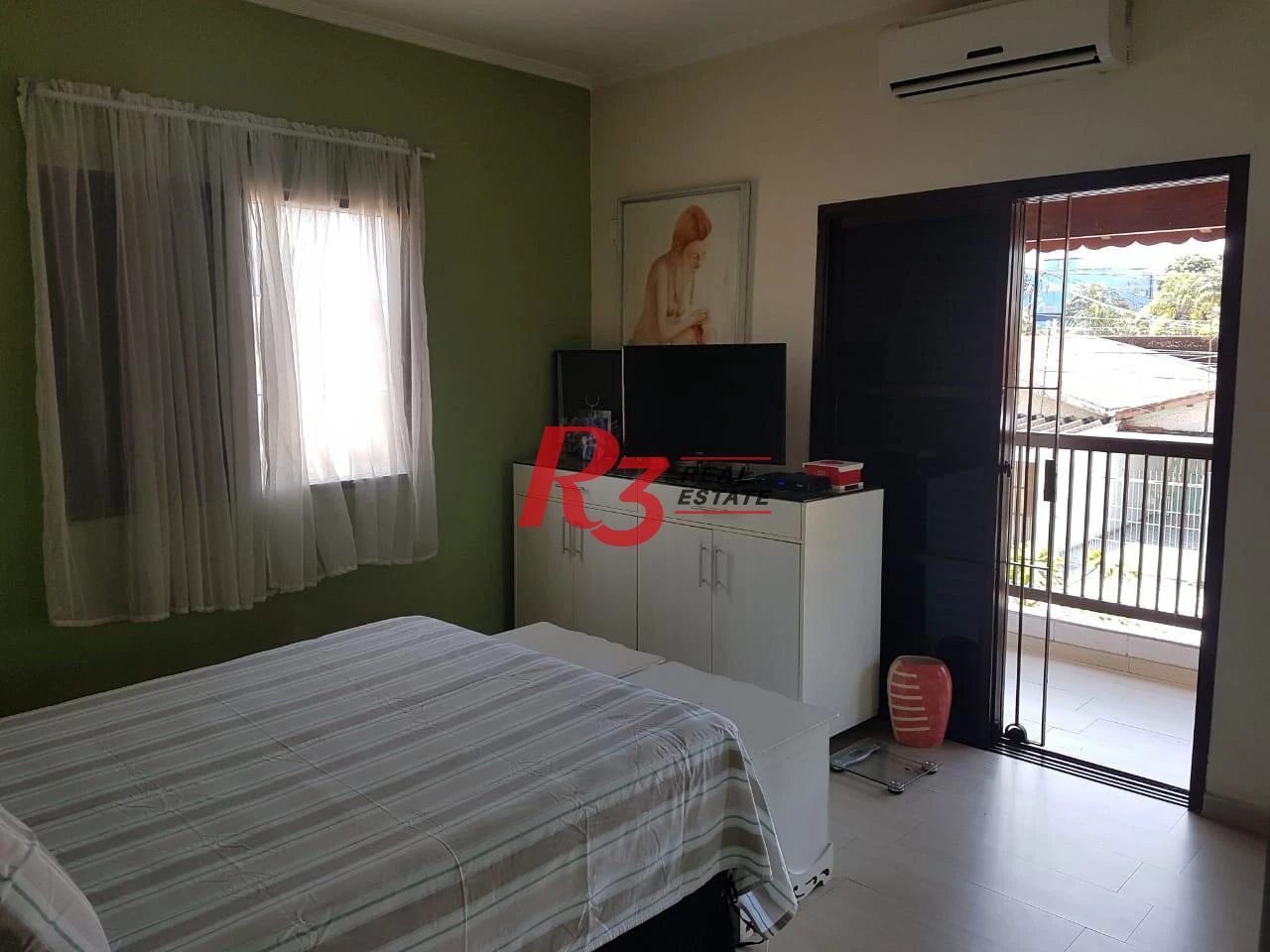 Sobrado com 3 dormitórios à venda, 124 m² por R$ 930.000,00 - Mirim - Praia Grande/SP
