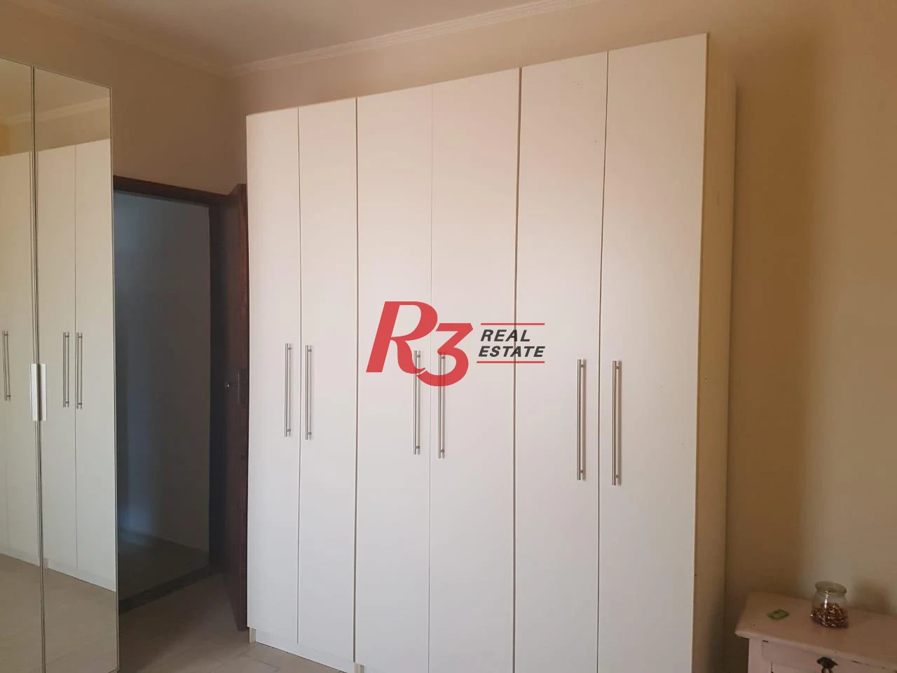 Sobrado com 3 dormitórios à venda, 124 m² por R$ 930.000,00 - Mirim - Praia Grande/SP