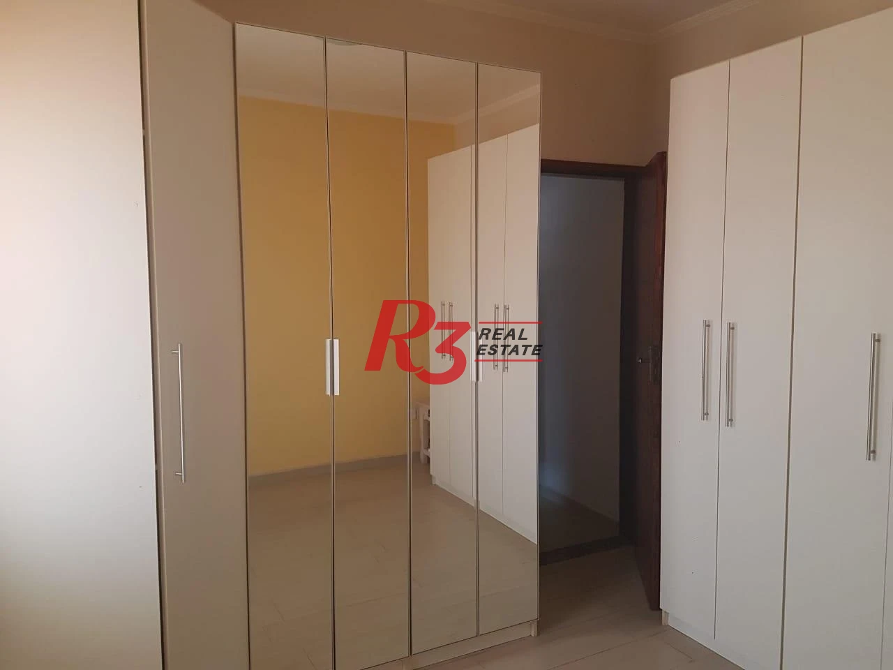 Sobrado com 3 dormitórios à venda, 124 m² por R$ 930.000,00 - Mirim - Praia Grande/SP