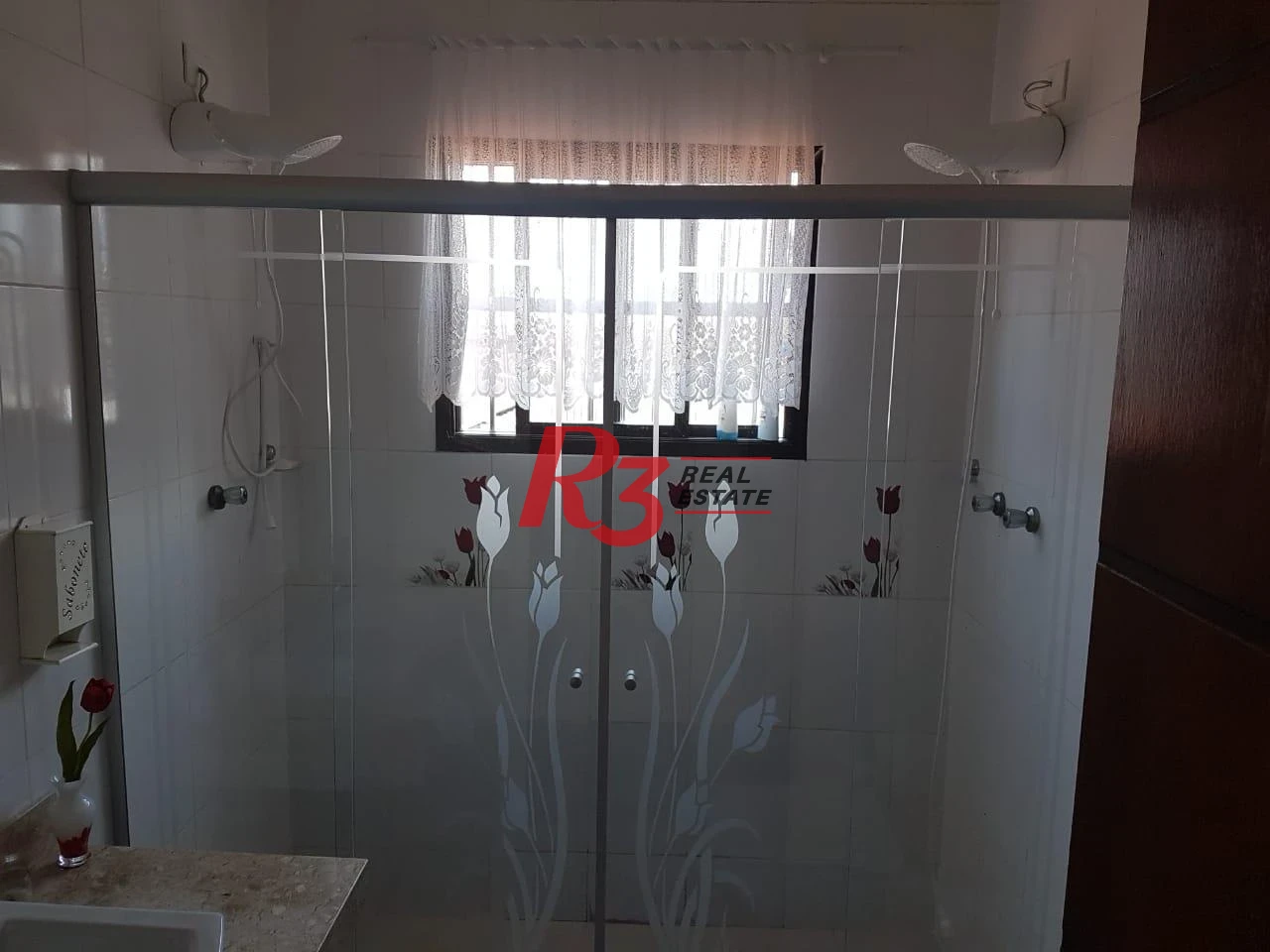 Sobrado com 3 dormitórios à venda, 124 m² por R$ 930.000,00 - Mirim - Praia Grande/SP