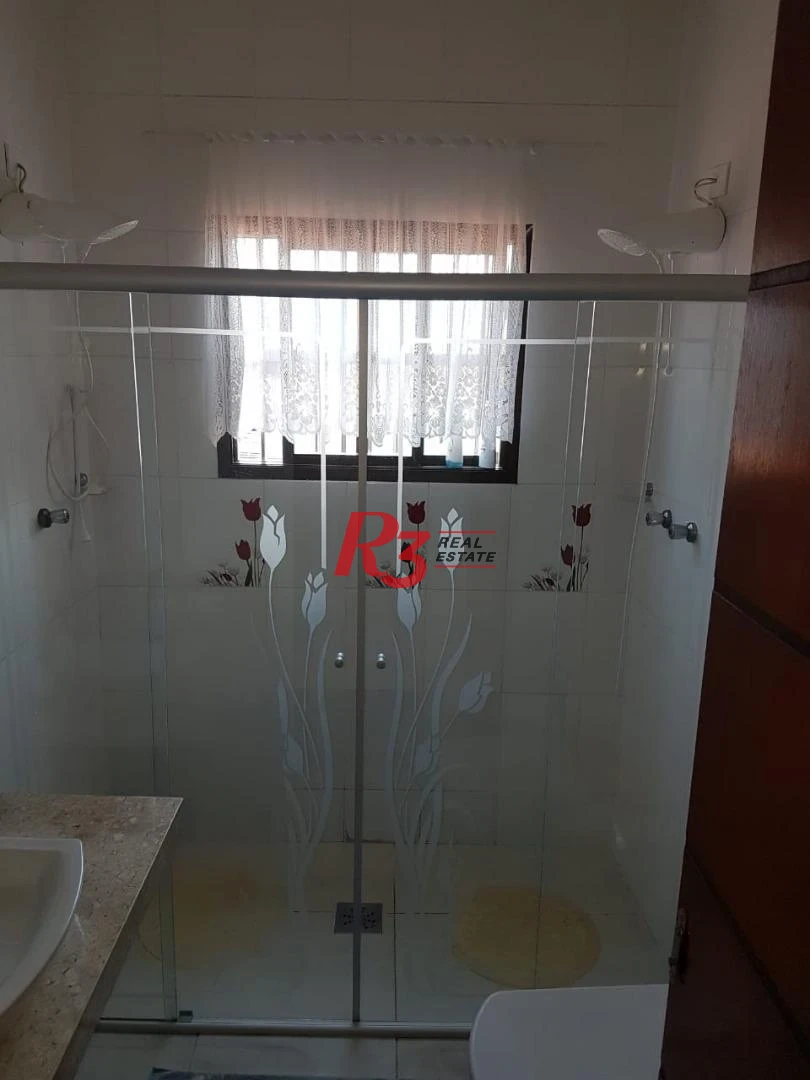 Sobrado com 3 dormitórios à venda, 124 m² por R$ 930.000,00 - Mirim - Praia Grande/SP