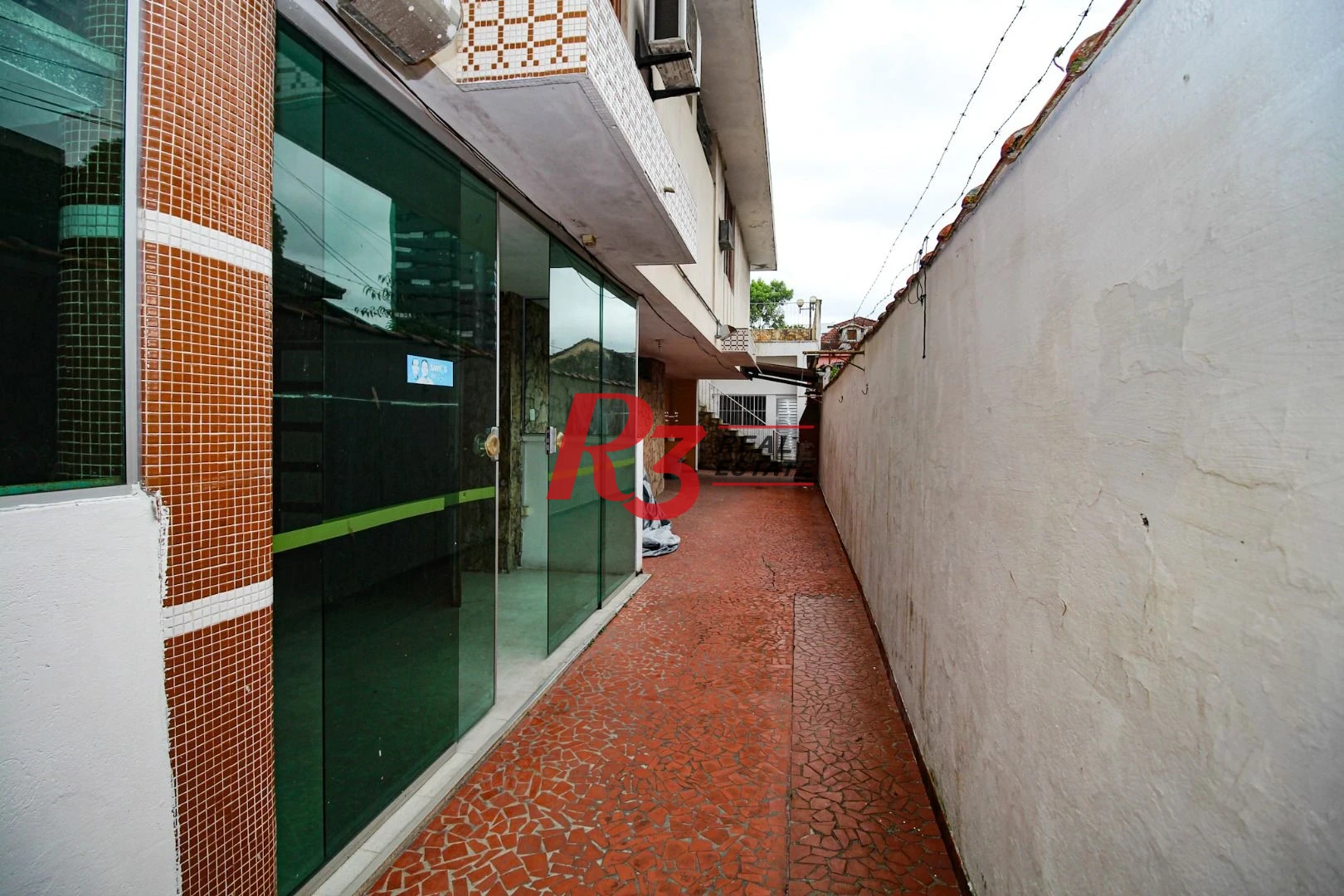 Sobrado à venda, 350 m² por R$ 1.450.000,00 - Encruzilhada - Santos/SP