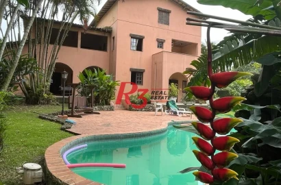 Casa, 600 m² - venda por R$ 2.200.000,00 ou aluguel por R$ 10.507,76/mês - Morro dos Barbosas - São Vicente/SP