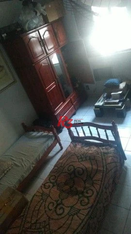 Sobrado com 5 dormitórios e piscina a venda em São Vicente.