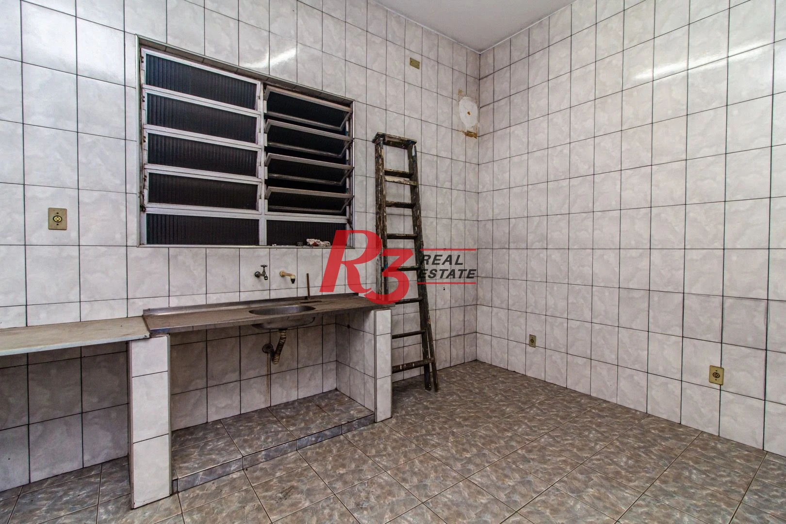 Prédio à venda, 630 m² por R$ 1.650.000,00 - Macuco - Santos/SP