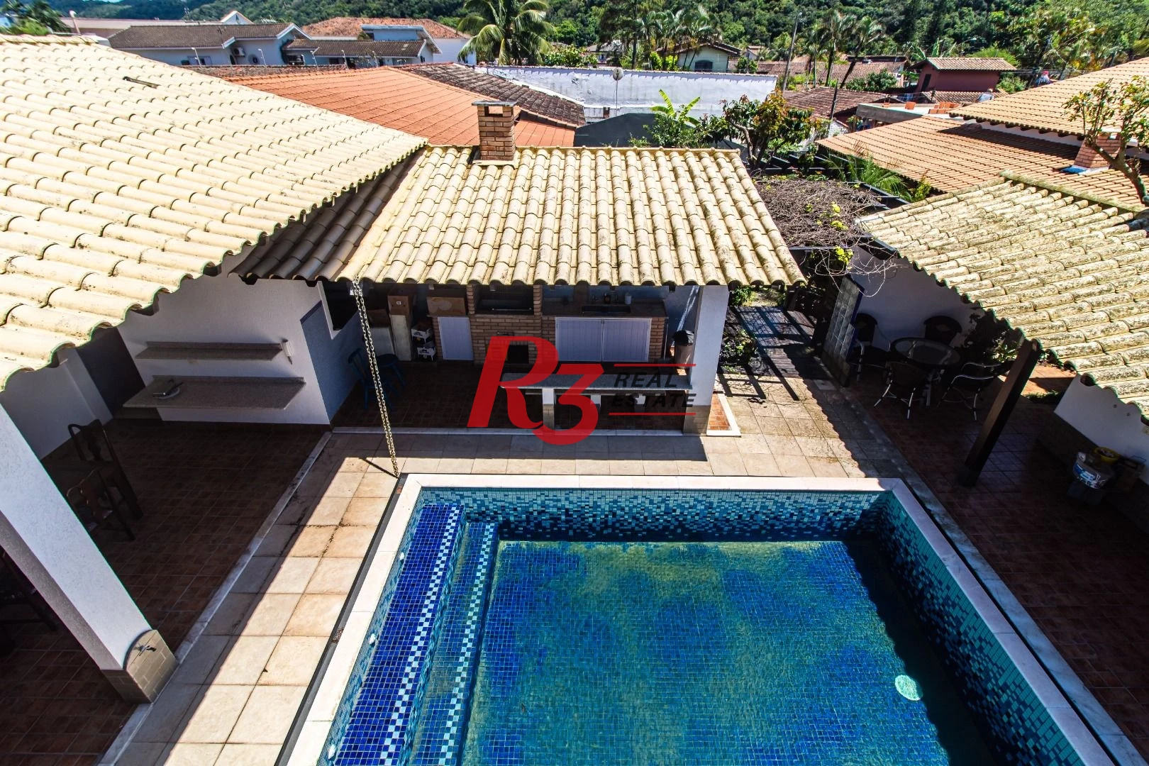 Casa com 4 dormitórios à venda, 360m² útil, R$ 1.250.000 - Praia do Tombo - Guarujá/SP