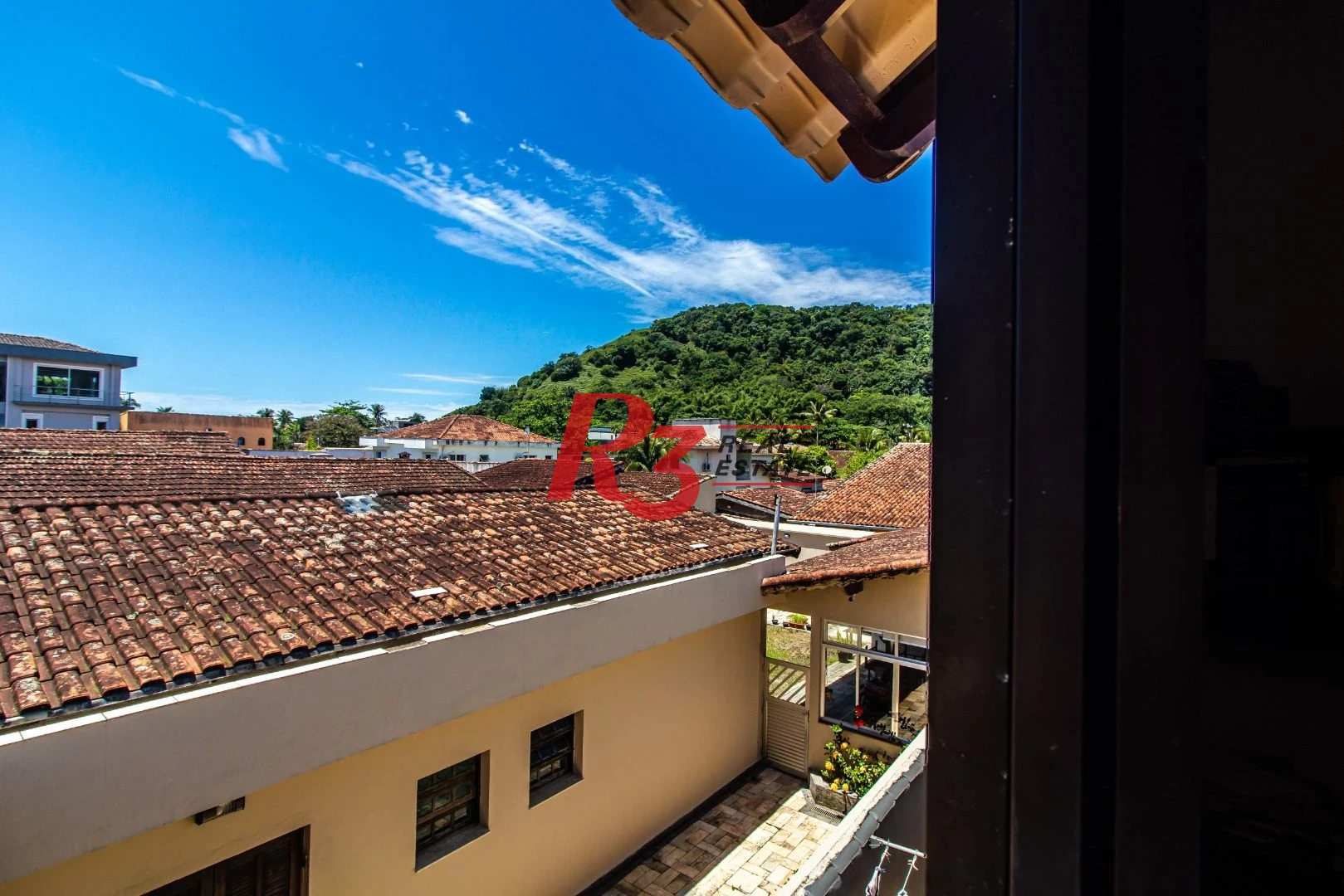Casa com 4 dormitórios à venda, 360m² útil, R$ 1.250.000 - Praia do Tombo - Guarujá/SP