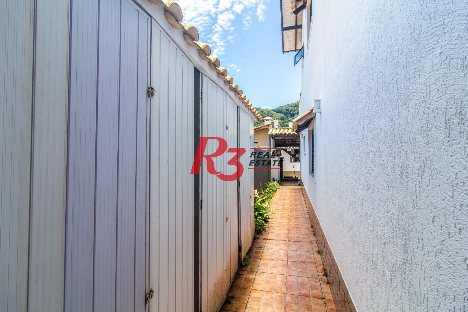 Casa com 4 dormitórios à venda, 360m² útil, R$ 1.250.000 - Praia do Tombo - Guarujá/SP