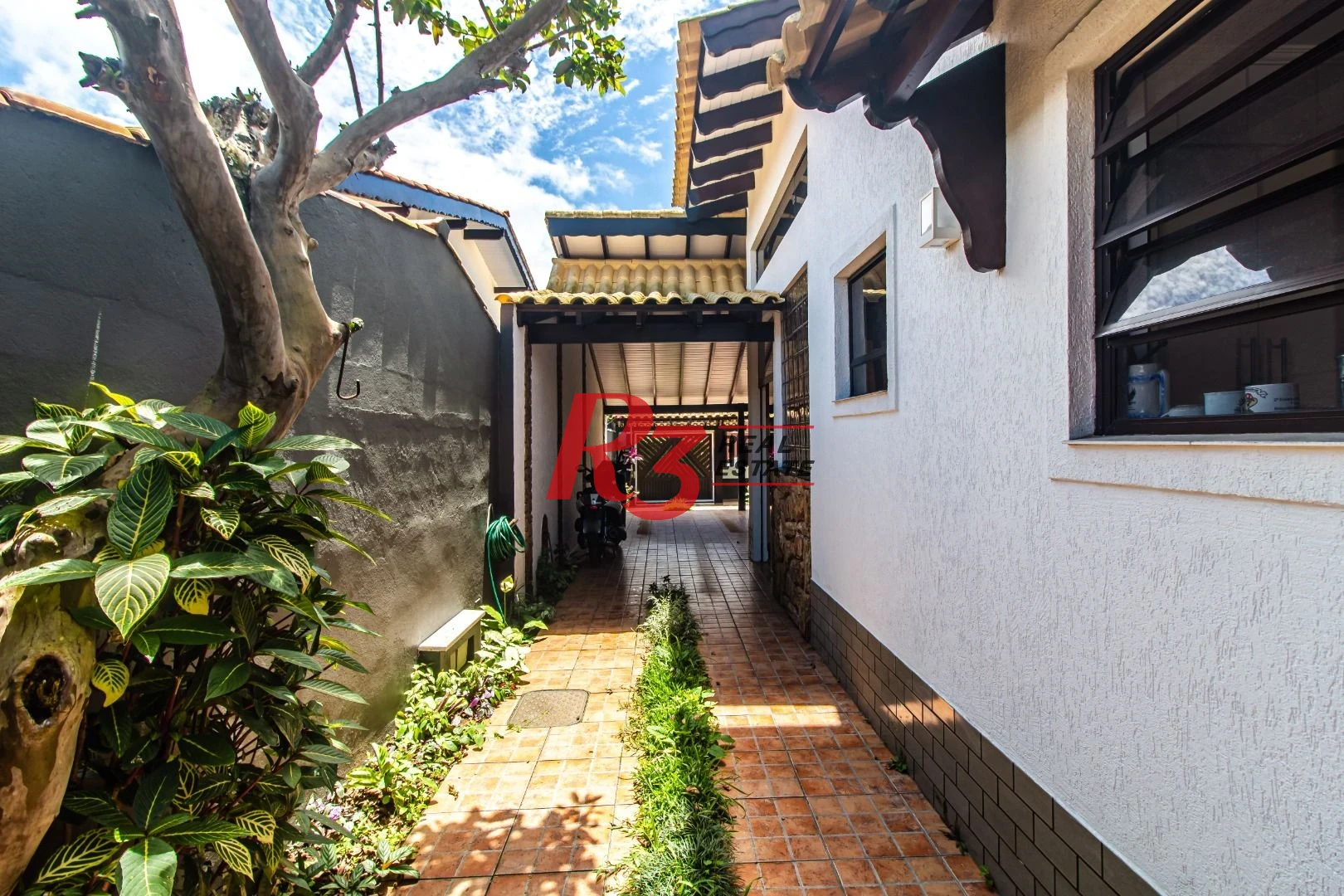 Casa com 4 dormitórios à venda, 360m² útil, R$ 1.250.000 - Praia do Tombo - Guarujá/SP