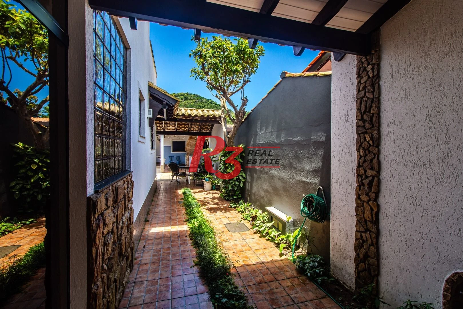Casa com 4 dormitórios à venda, 360m² útil, R$ 1.250.000 - Praia do Tombo - Guarujá/SP