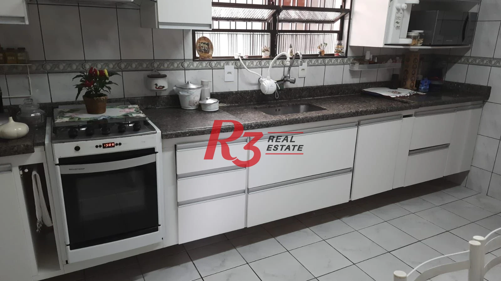 Sobrado à venda, 240 m² por R$ 1.320.000,00 - Estuário - Santos/SP