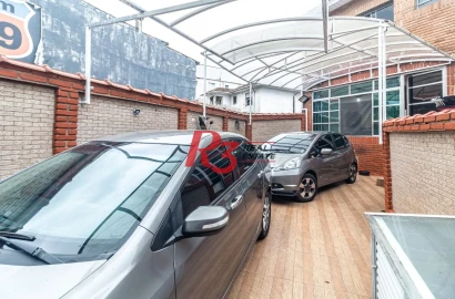 Sobrado com 3 dormitórios à venda, 139 m² por R$ 765.000,00 - Marapé - Santos/SP