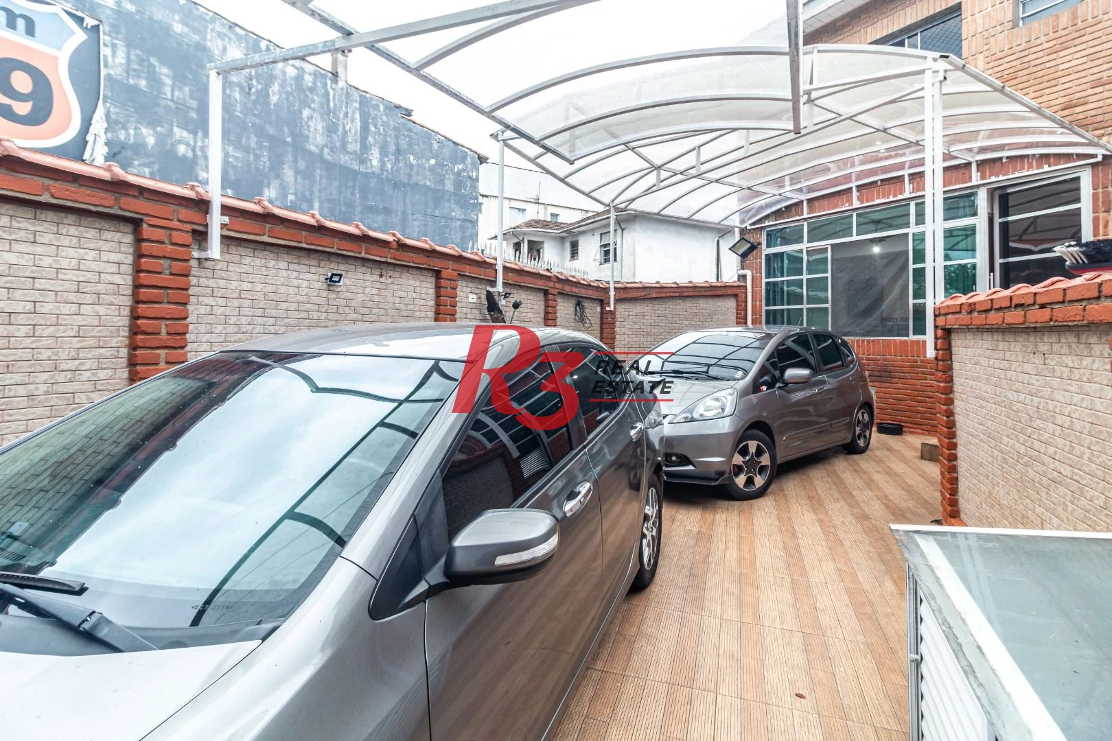 Sobrado com 3 dormitórios à venda, 139 m² por R$ 765.000,00 - Marapé - Santos/SP