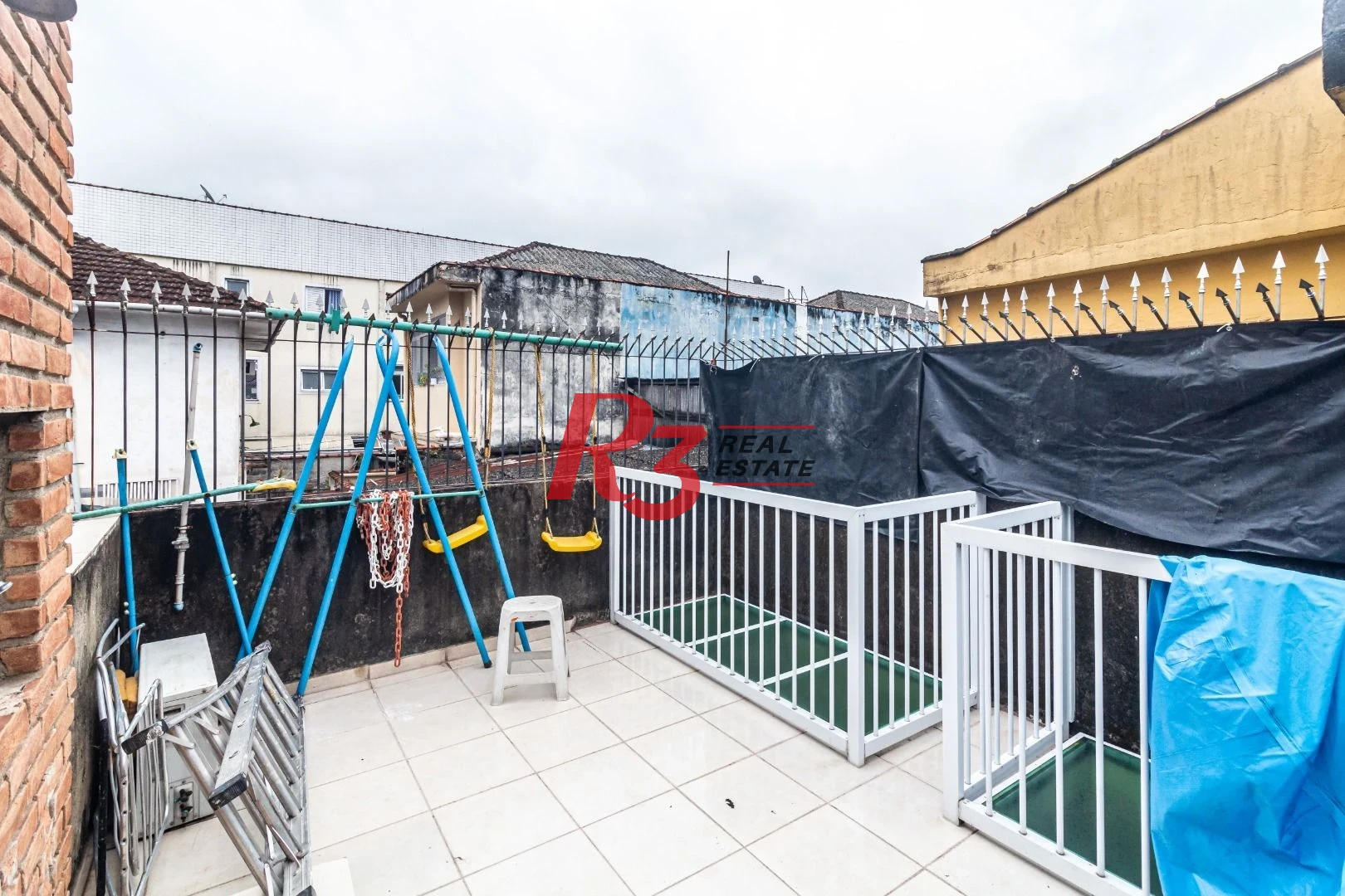 Sobrado com 3 dormitórios à venda, 139 m² por R$ 765.000,00 - Marapé - Santos/SP