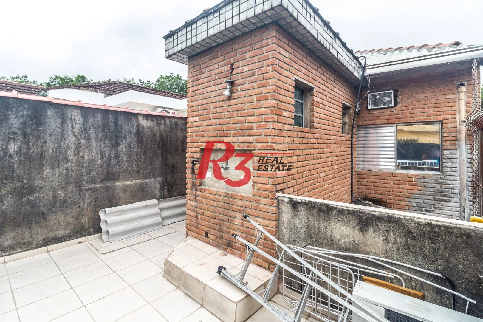 Sobrado com 3 dormitórios à venda, 139 m² por R$ 765.000,00 - Marapé - Santos/SP