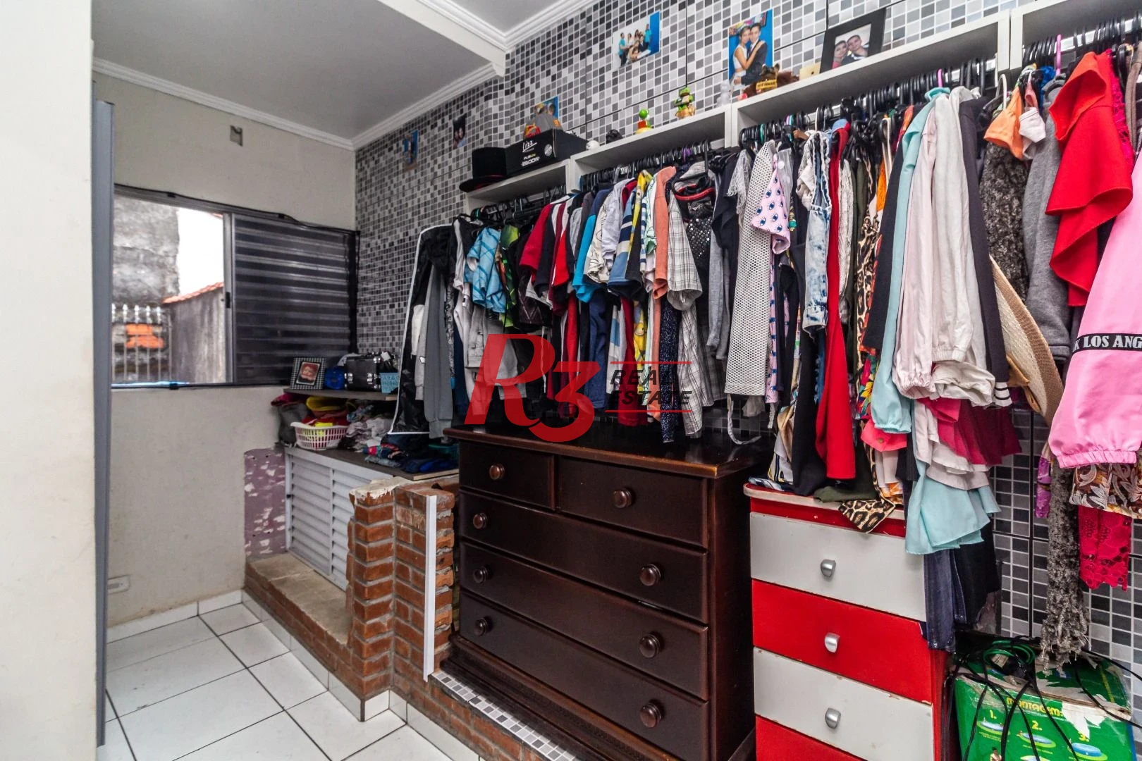 Sobrado com 3 dormitórios à venda, 139 m² por R$ 765.000,00 - Marapé - Santos/SP