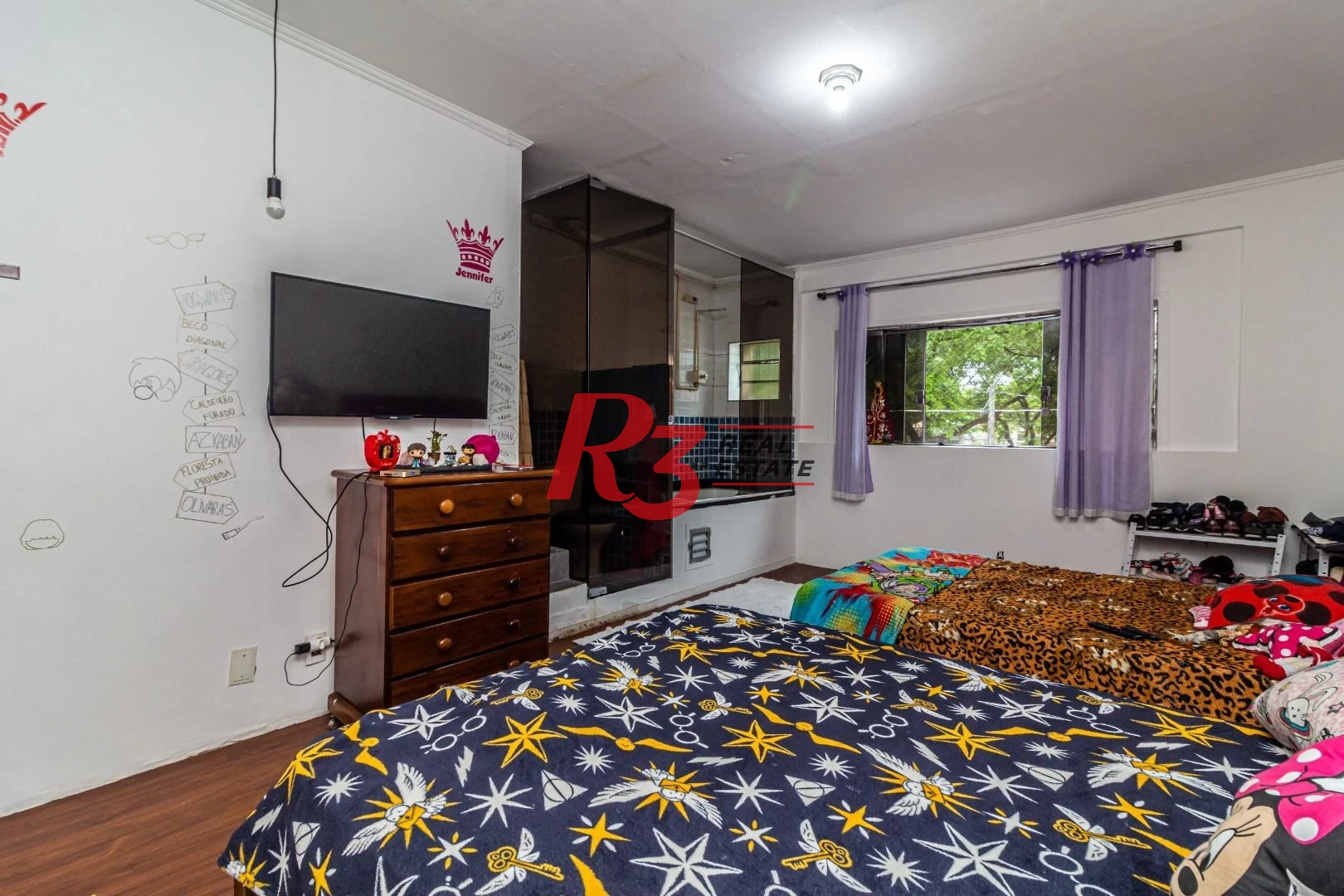 Sobrado com 3 dormitórios à venda, 139 m² por R$ 765.000,00 - Marapé - Santos/SP