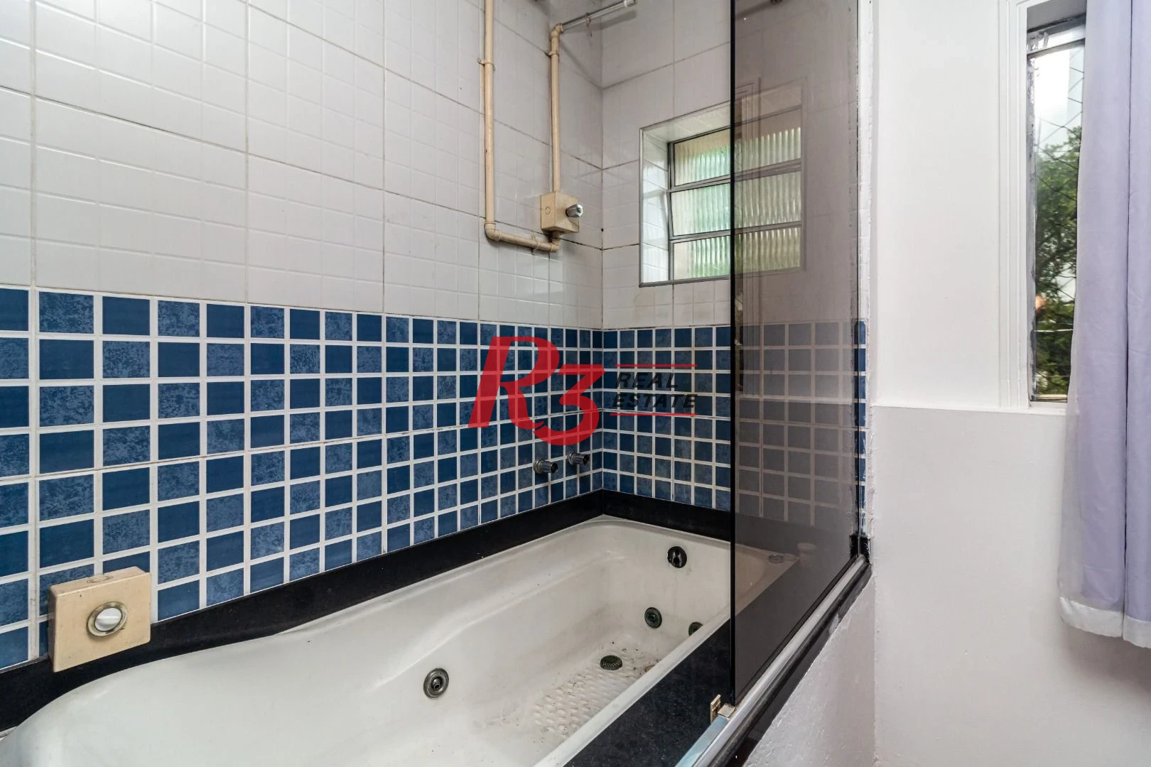 Sobrado com 3 dormitórios à venda, 139 m² por R$ 765.000,00 - Marapé - Santos/SP