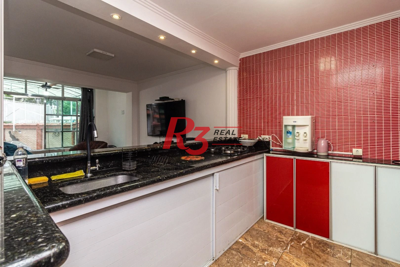 Sobrado com 3 dormitórios à venda, 139 m² por R$ 765.000,00 - Marapé - Santos/SP