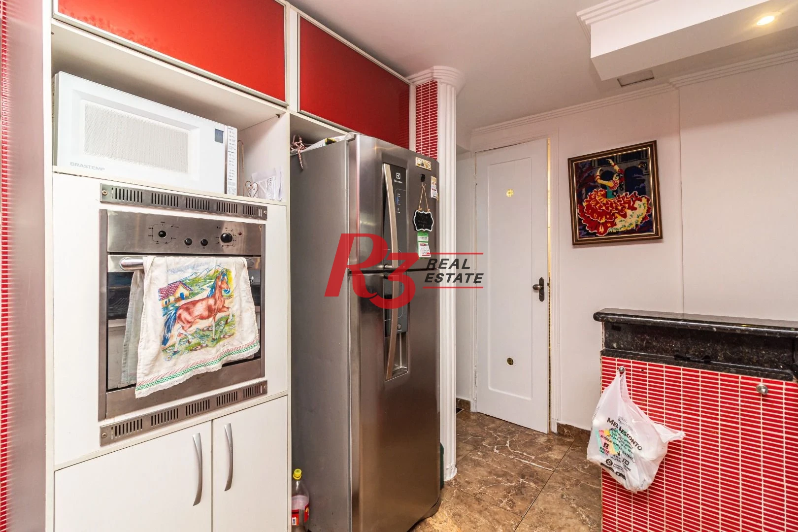 Sobrado com 3 dormitórios à venda, 139 m² por R$ 765.000,00 - Marapé - Santos/SP