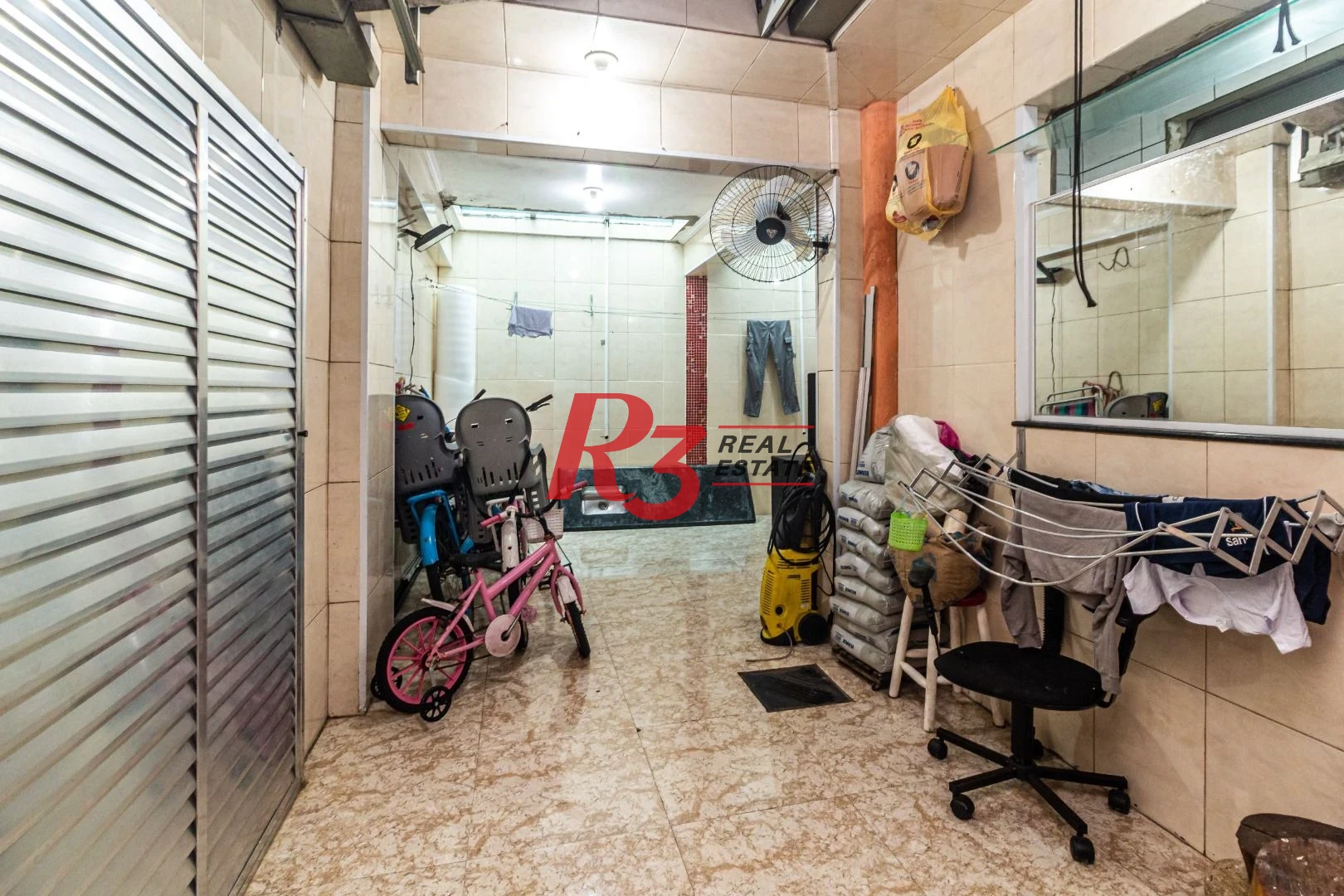 Sobrado com 3 dormitórios à venda, 139 m² por R$ 765.000,00 - Marapé - Santos/SP