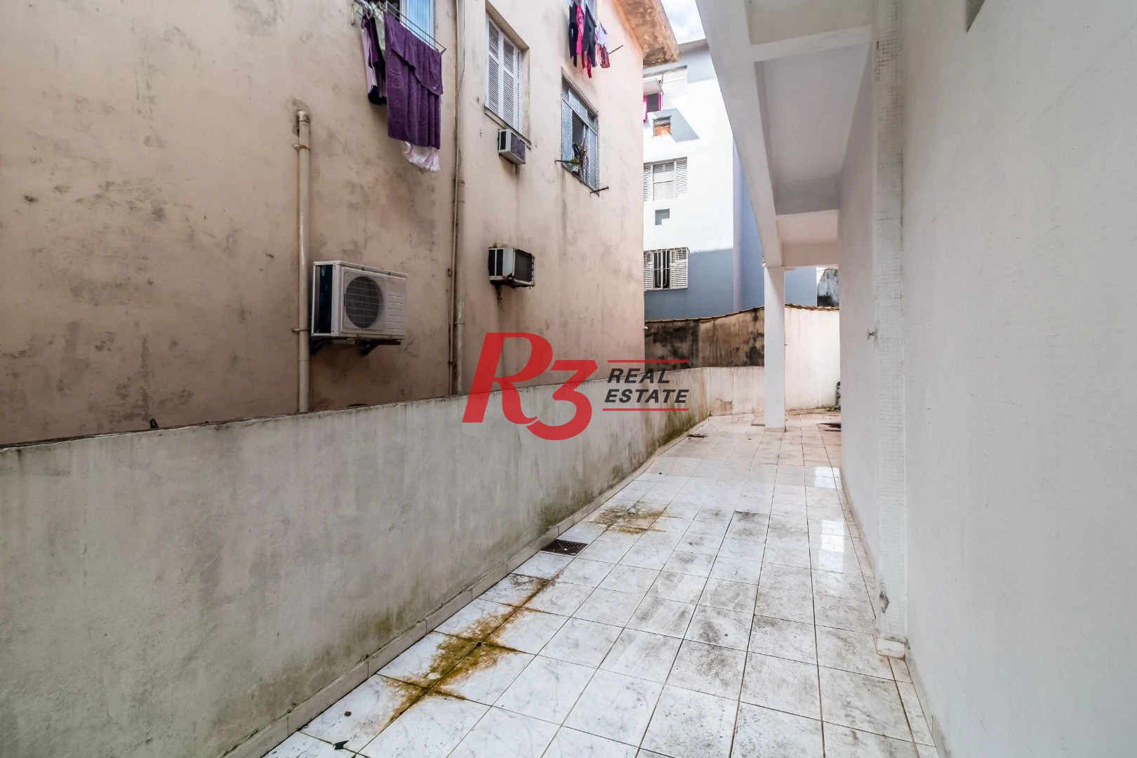 Prédio para alugar, 217 m² por R$ 15.300,00/mês - Estuário - Santos/SP