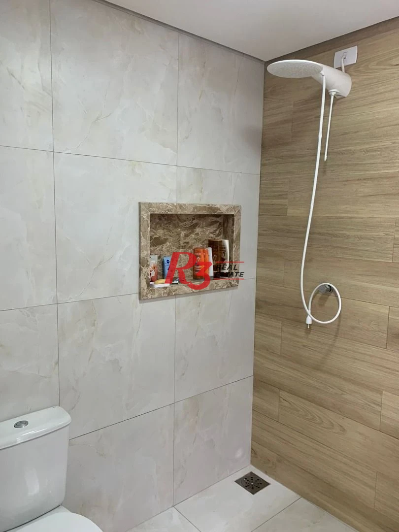 Sobrado com 3 dormitórios à venda, 138 m² por R$ 1.200.000,00 - Boqueirão - Santos/SP