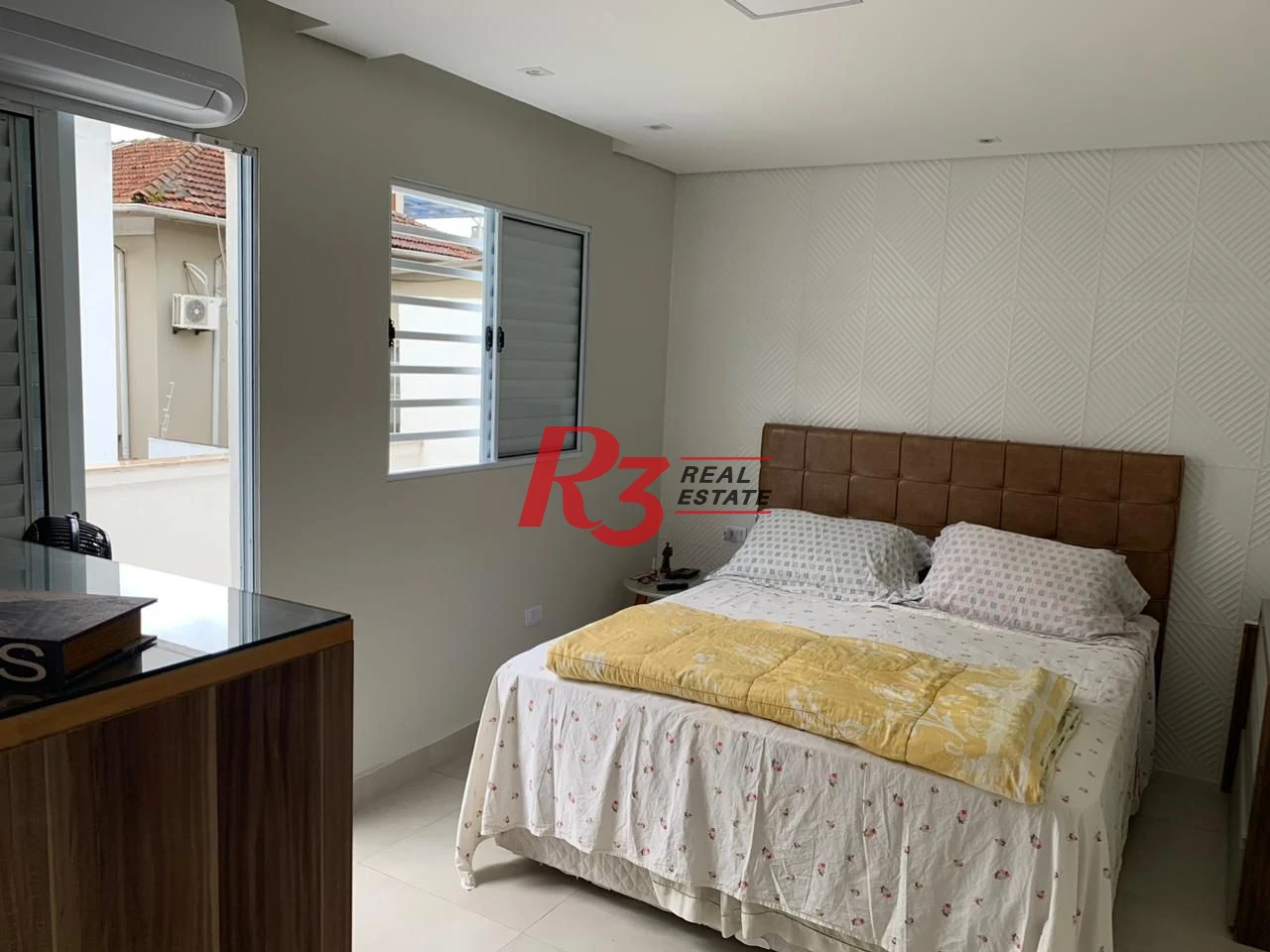 Sobrado com 3 dormitórios à venda, 138 m² por R$ 1.200.000,00 - Boqueirão - Santos/SP