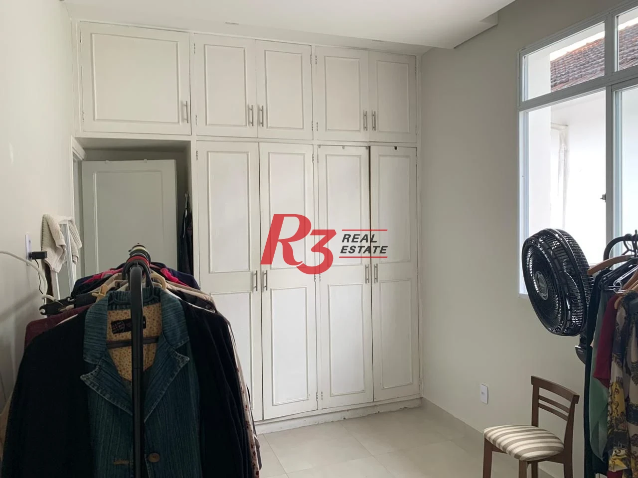 Sobrado com 3 dormitórios à venda, 138 m² por R$ 1.200.000,00 - Boqueirão - Santos/SP