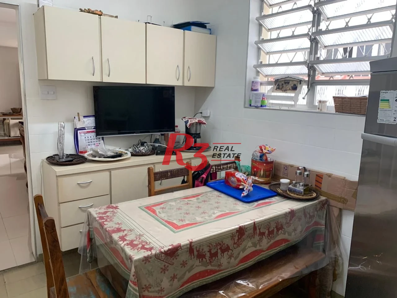 Sobrado com 3 dormitórios à venda, 138 m² por R$ 1.200.000,00 - Boqueirão - Santos/SP