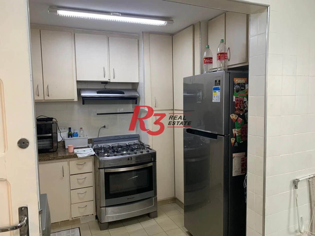 Sobrado com 3 dormitórios à venda, 138 m² por R$ 1.200.000,00 - Boqueirão - Santos/SP
