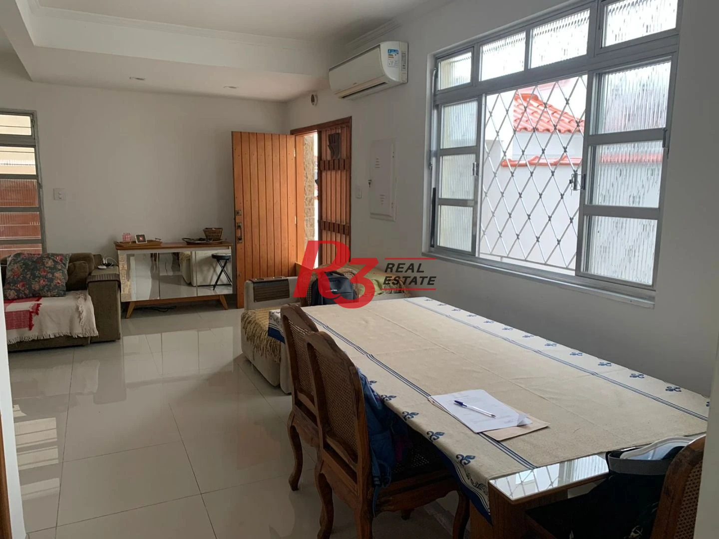 Sobrado com 3 dormitórios à venda, 138 m² por R$ 1.200.000,00 - Boqueirão - Santos/SP