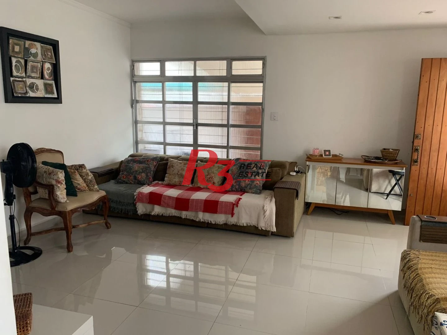 Sobrado com 3 dormitórios à venda, 138 m² por R$ 1.200.000,00 - Boqueirão - Santos/SP