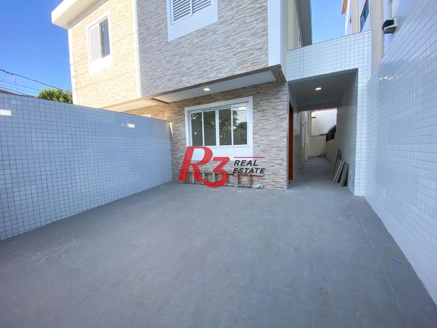 Sobrado com 3 dormitórios à venda, 120 m² por R$ 1.245.000,00 - Boqueirão - Santos/SP