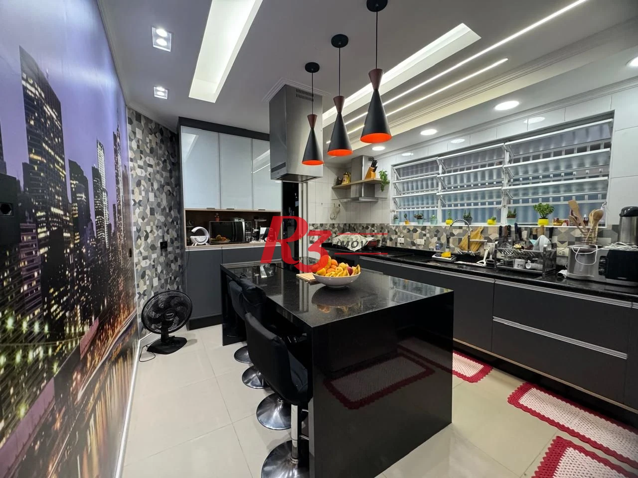 Casa com 3 dormitórios à venda, 189 m² por R$ 1.680.000,00 - Campo Grande - Santos/SP