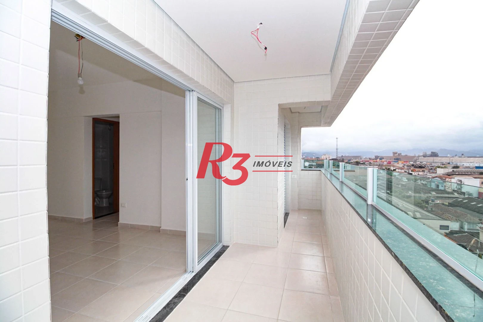 Apartamento com 2 dormitórios à venda, 61 m² por R$ 550.000,00 - Macuco - Santos/SP