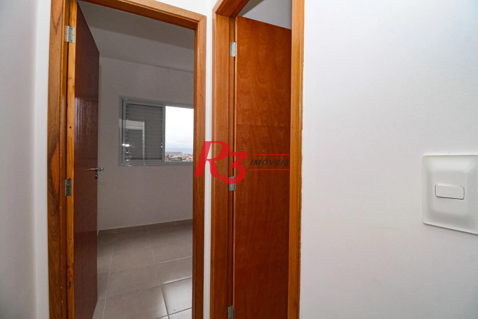 Apartamento com 2 dormitórios à venda, 61 m² por R$ 550.000,00 - Macuco - Santos/SP