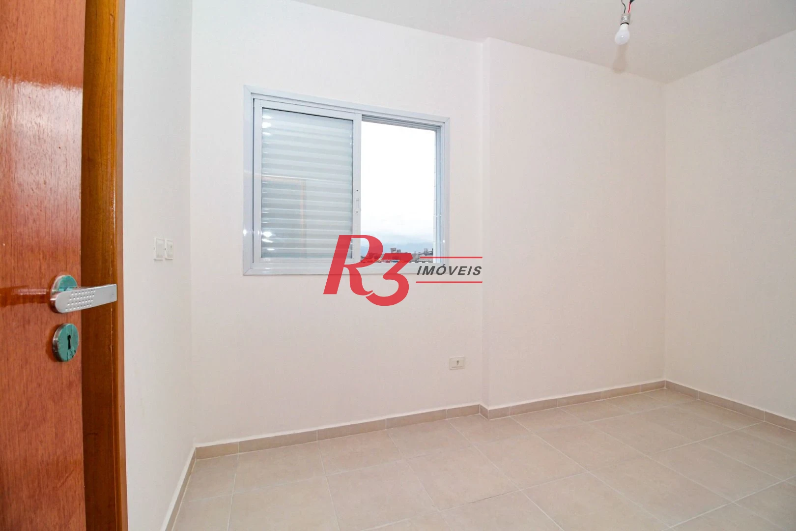 Apartamento com 2 dormitórios à venda, 61 m² por R$ 550.000,00 - Macuco - Santos/SP