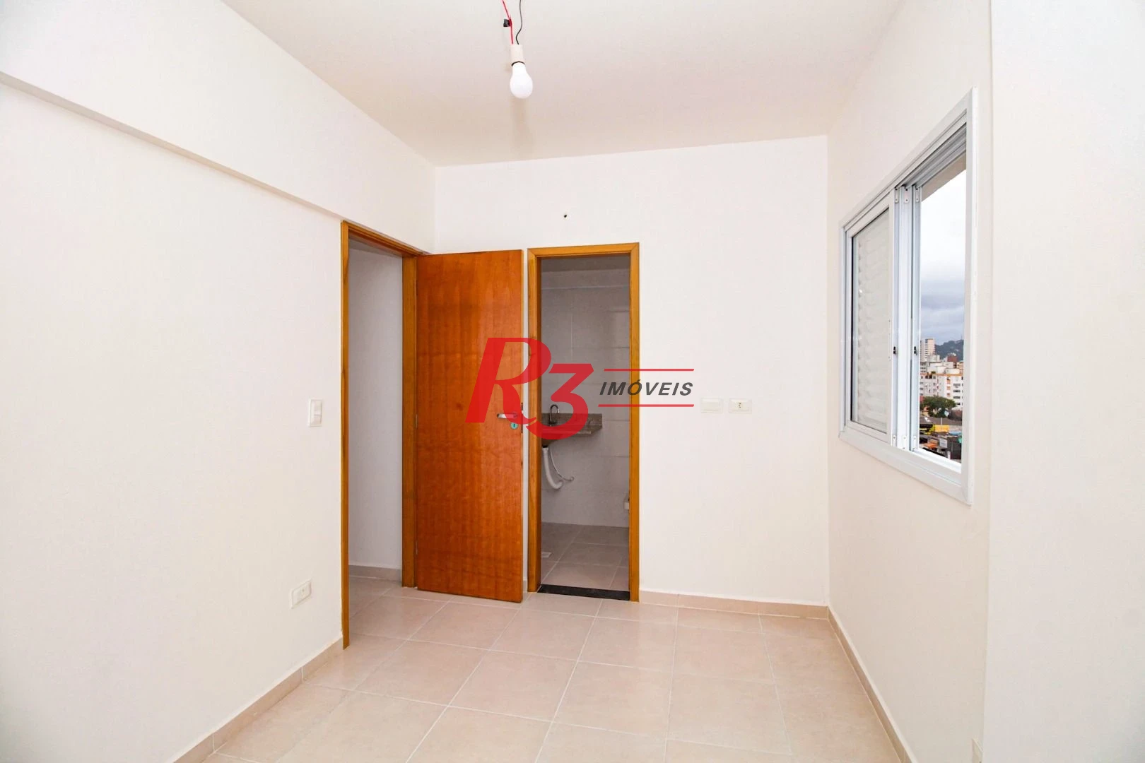 Apartamento com 2 dormitórios à venda, 61 m² por R$ 550.000,00 - Macuco - Santos/SP