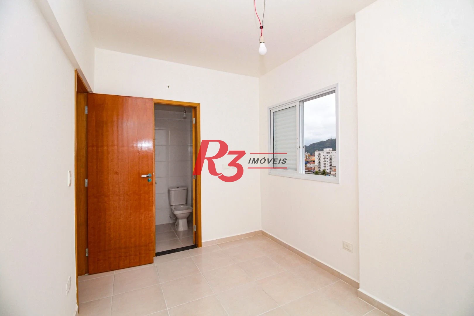 Apartamento com 2 dormitórios à venda, 61 m² por R$ 550.000,00 - Macuco - Santos/SP