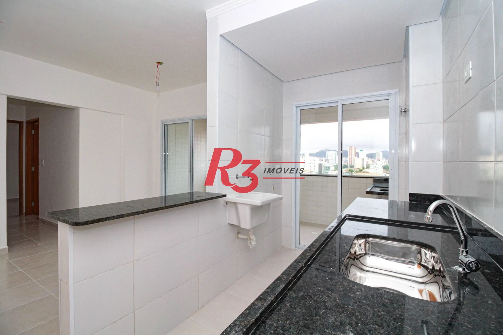 Apartamento com 2 dormitórios à venda, 59 m² por R$ 520.000,00 - Macuco - Santos/SP
