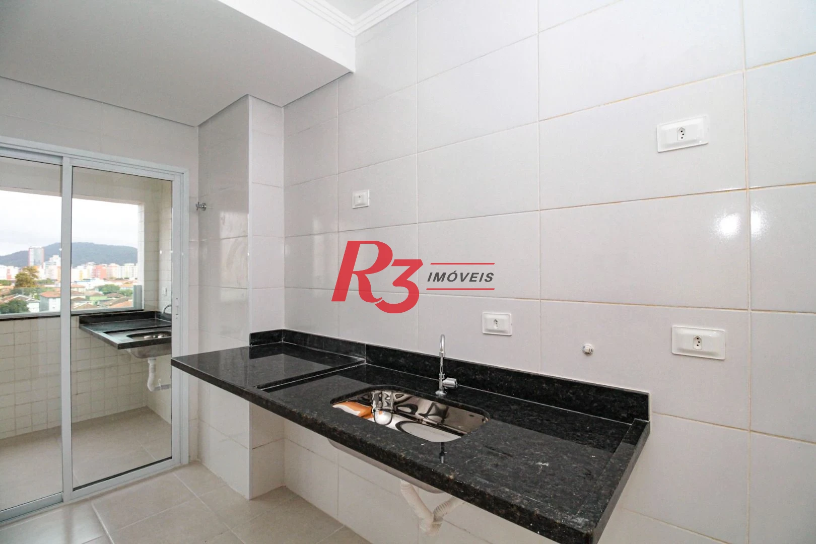 Apartamento com 2 dormitórios à venda, 59 m² por R$ 520.000,00 - Macuco - Santos/SP