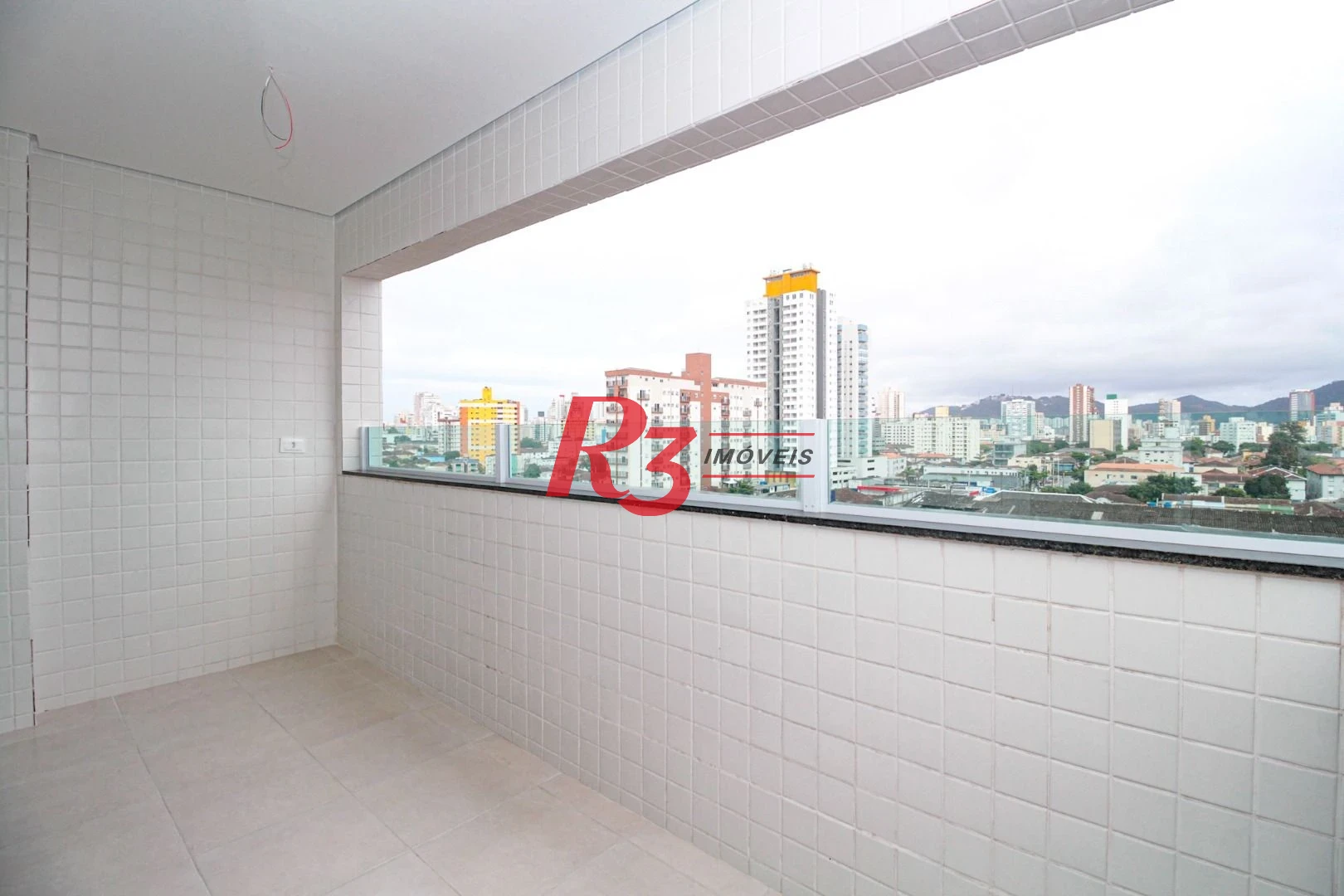 Apartamento com 2 dormitórios à venda, 59 m² por R$ 520.000,00 - Macuco - Santos/SP