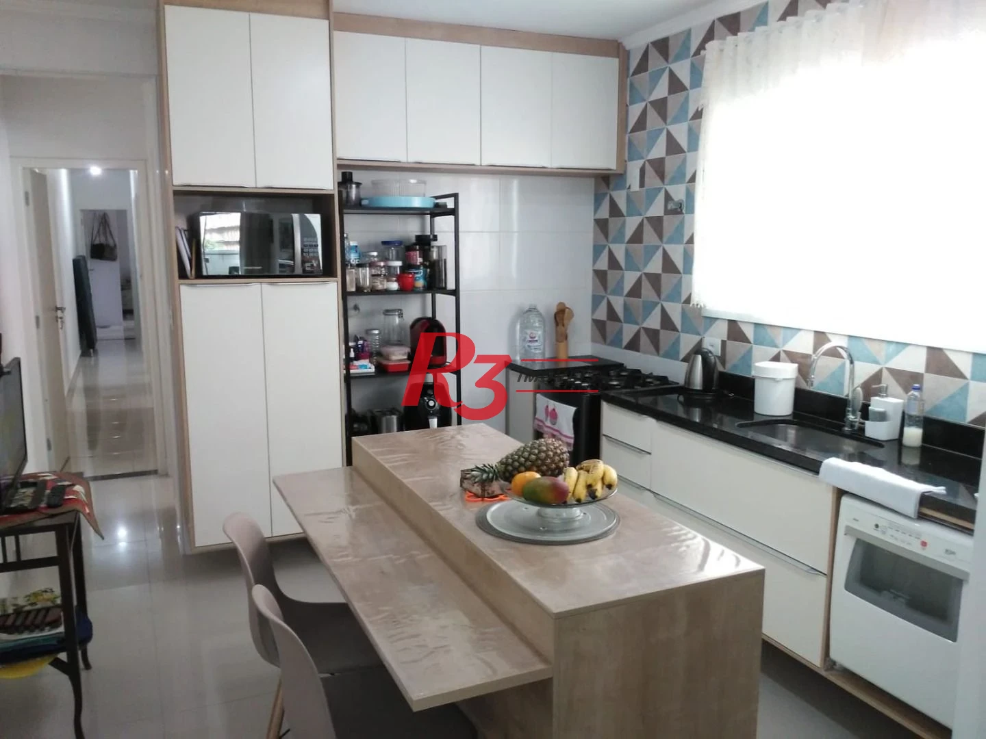 Casa à venda, 128 m² por R$ 775.000,00 - Ponta da Praia - Santos/SP