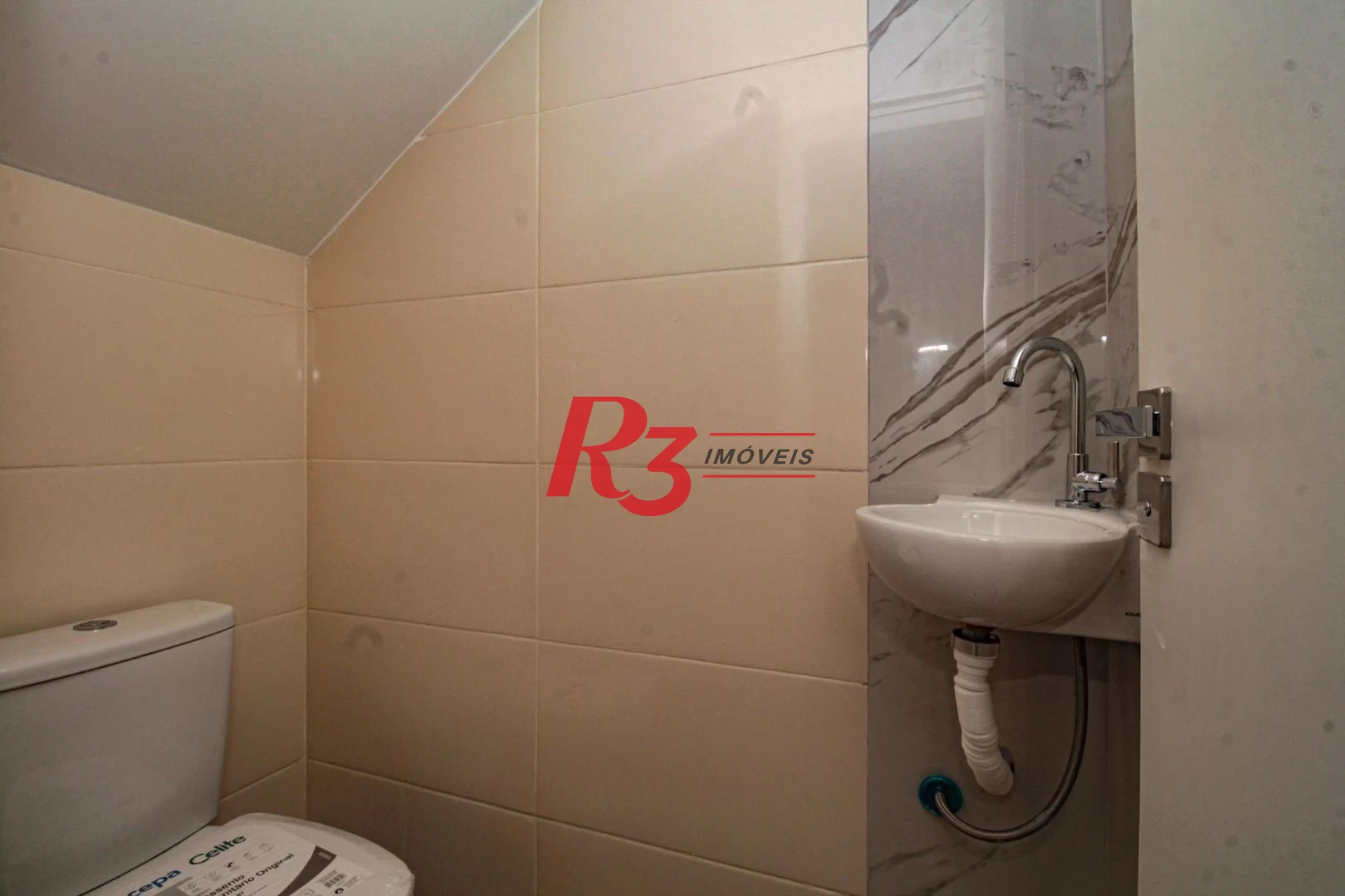 Sobrado com 2 dormitórios à venda, 140 m² por R$ 699.500,00 - Marapé - Santos/SP